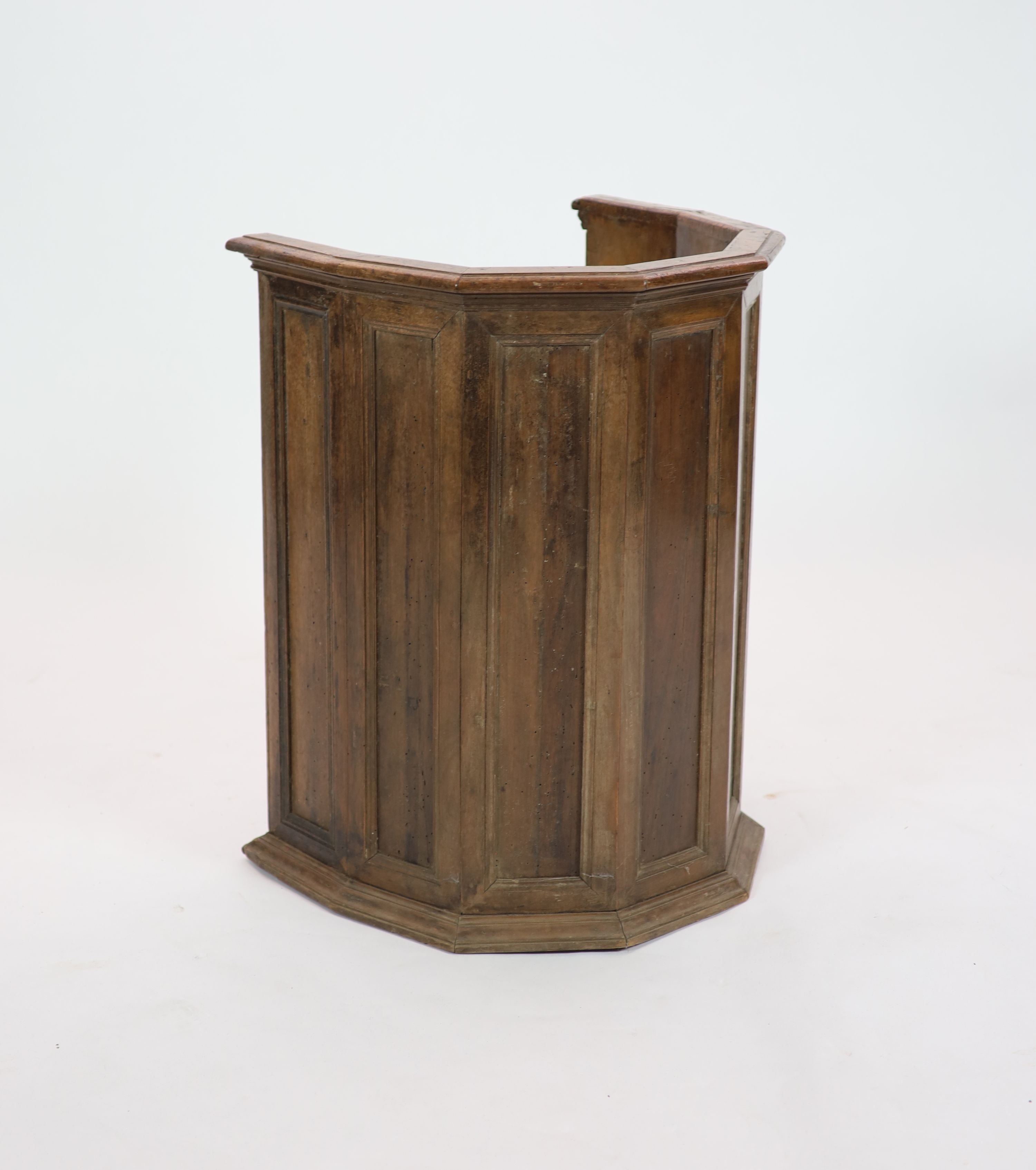 A late 16th century Italian walnut tub chair, possibly Tuscan, having H 79cm. W 60cm. D 46cm.